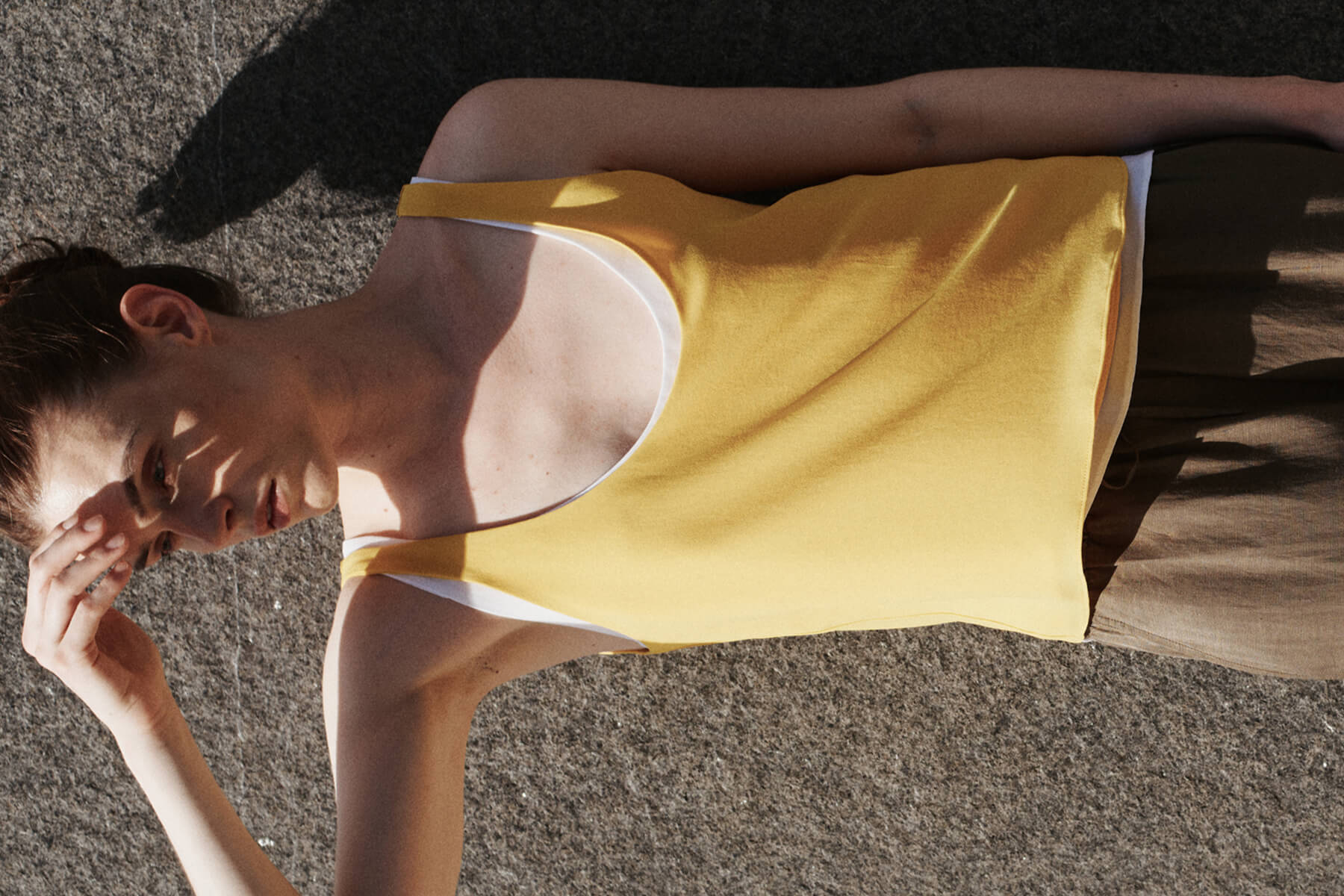 Close up of Ari in Daffodil against wall