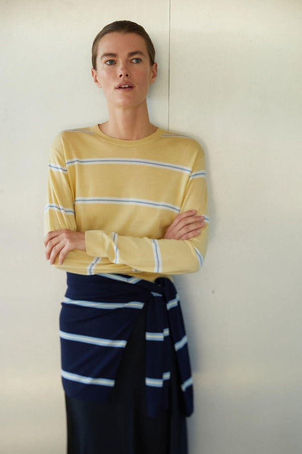 Woman in James Stripe lemon sweater
