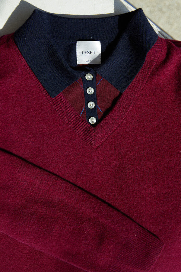 Folded argyle James sweater underneath layered mulberry sweater.