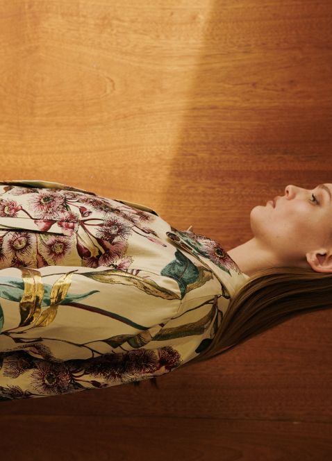 Side view of model is pam floral jacket.