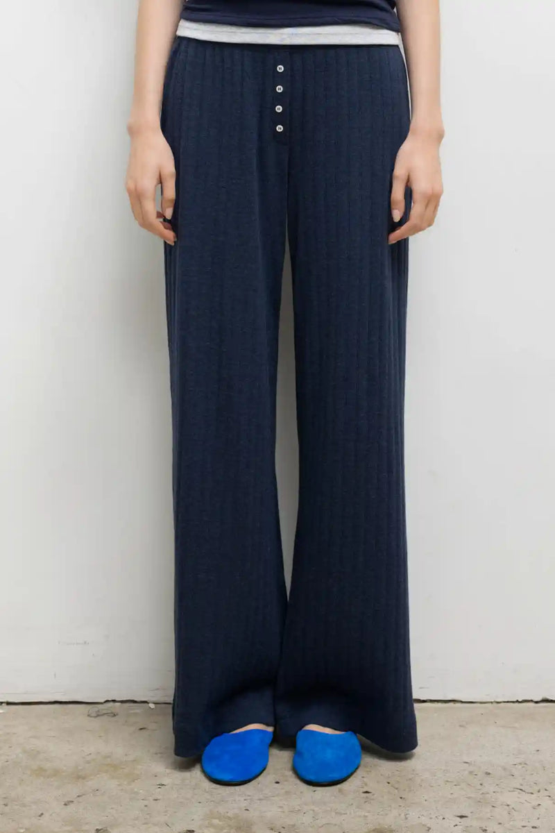 Close up of model wearing the Pointelle boxer pant in midnight.