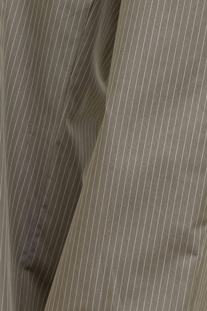 Close up of Yoshi olive pinstripe