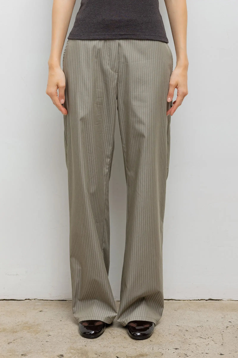 Close up of yoshi stripe painter pants in olive.